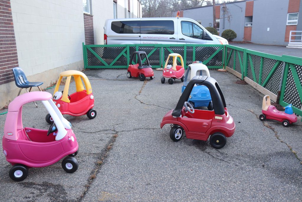 Burlington tender learning centre bike playground with ride in cars and trucks