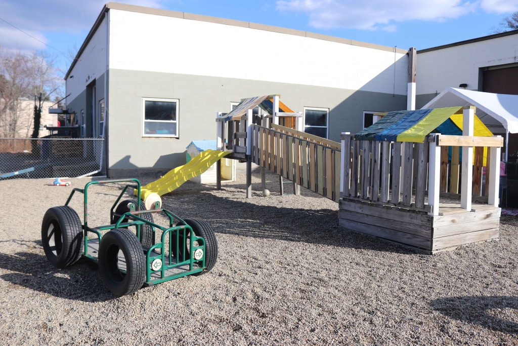 Burlington Tender Learning Centre Big playground with structures and slides