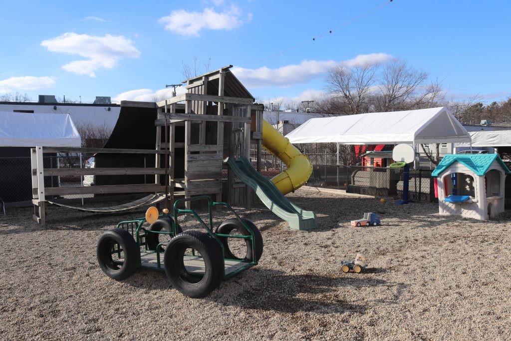 Burlington Tender Learning Centre Big playground with structures and slides